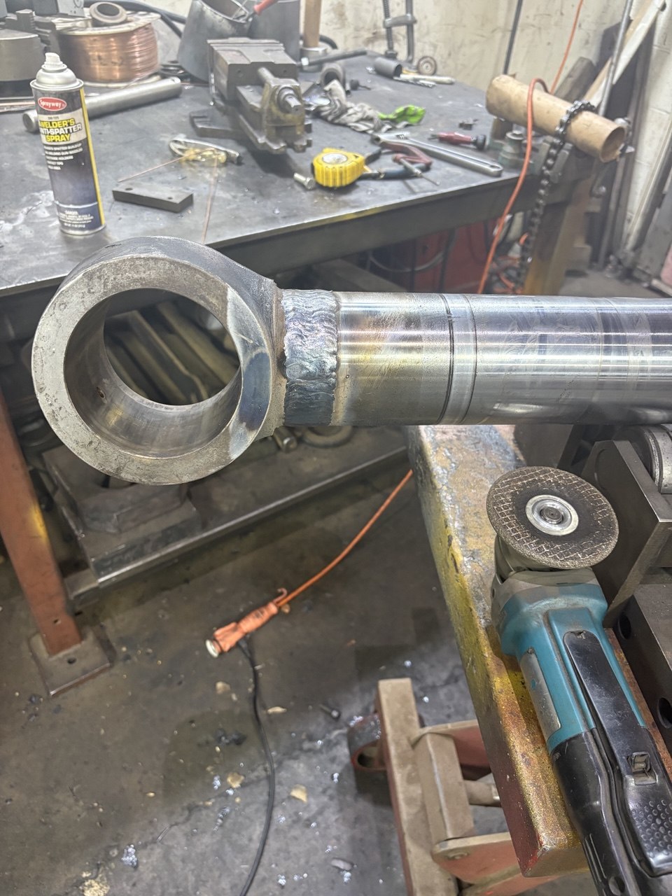 On-site structural welding at construction site with full PPE