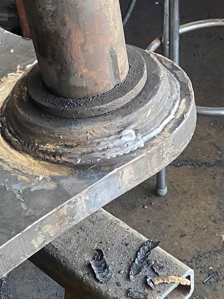 TIG welding aluminum closeup with bright blue arc and clean weld bead